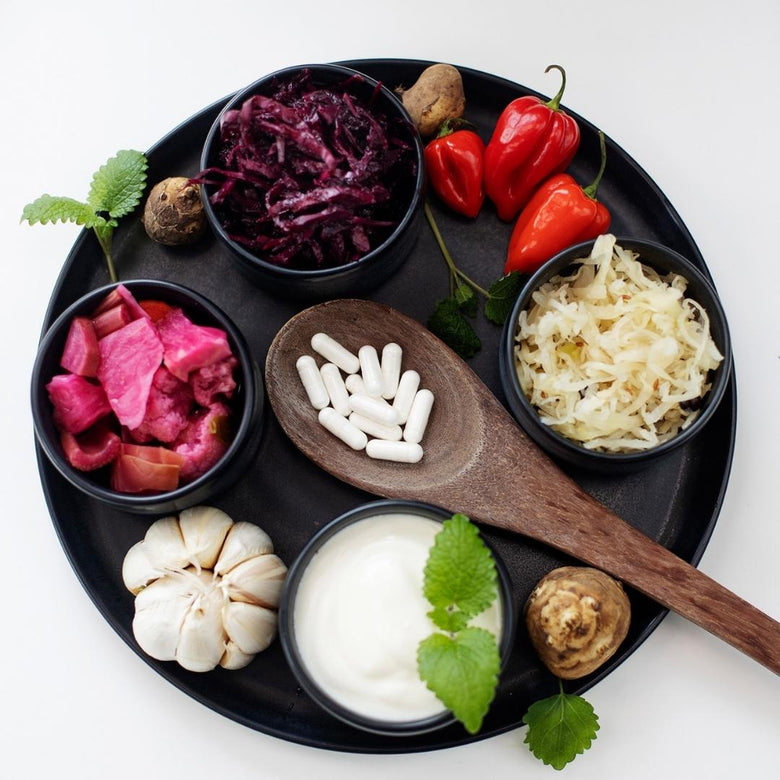 Probiotic capsules with fermented foods – natural sources of 5 lactobacillus strains.