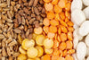  Various beans and lentils displayed – foods that are high in FODMAPs and may trigger IBS symptoms in some individuals.