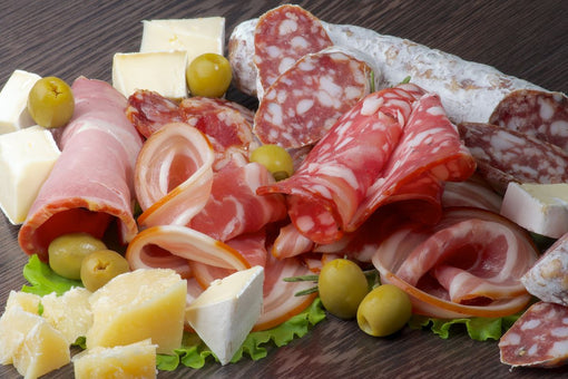Cured meats and aged cheese, foods often discussed in relation to histamine sensitivity.